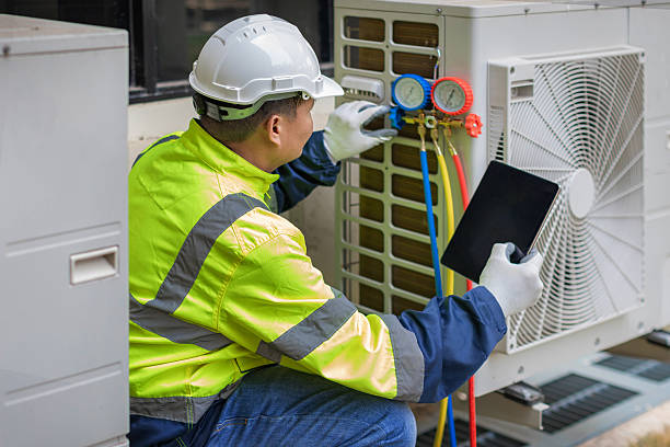 Professional Ductwork Repair technician working in West Des Moines, IA